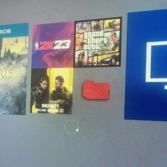 PlayStation 4 with games and two controllers